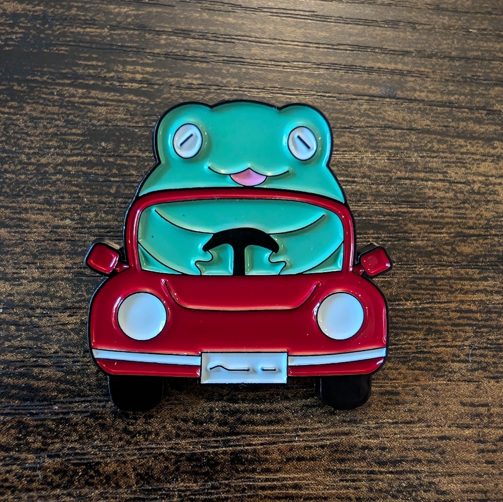 Driving Frog Enamel Pin